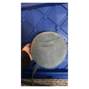 Portland Leather Small Circle Crossbody- Color: STORM